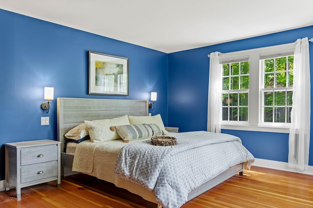 34 W Ave, Essex, CT 06426 - bedroom with wood finished floors and baseboards