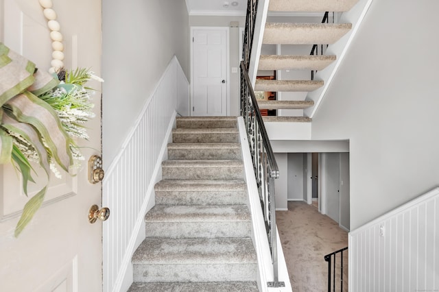 44 Columbus Pl Unit 2, Stamford, CT 06907 - stairway with carpet floors, crown molding, and a high ceiling