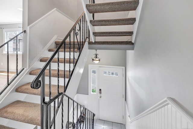 44 Columbus Pl Unit 2, Stamford, CT 06907 - stairs with tile patterned floors and wainscoting