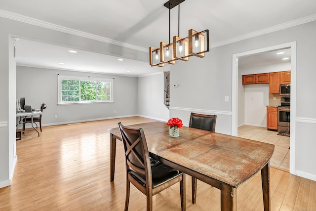 44 Columbus Pl Unit 2, Stamford, CT 06907 - dining space featuring light wood-style floors, crown molding, a desk, recessed lighting, and baseboards