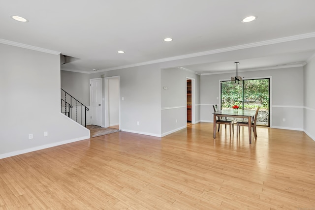 44 Columbus Pl Unit 2, Stamford, CT 06907 - unfurnished dining area featuring stairway, baseboards, ornamental molding, light wood finished floors, and recessed lighting