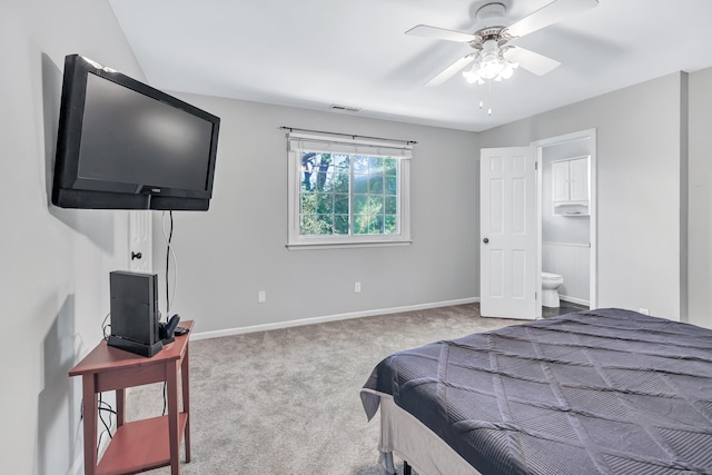 44 Columbus Pl Unit 2, Stamford, CT 06907 - carpeted bedroom featuring baseboards, ceiling fan, and ensuite bath