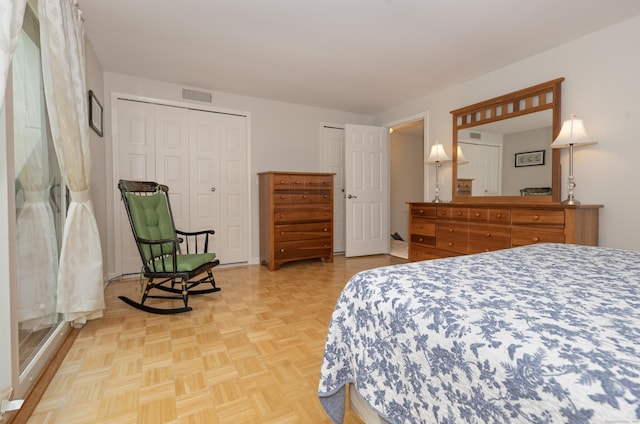 34 Harbour Vlg Unit A, Branford, CT 06405 - bedroom featuring visible vents and multiple closets