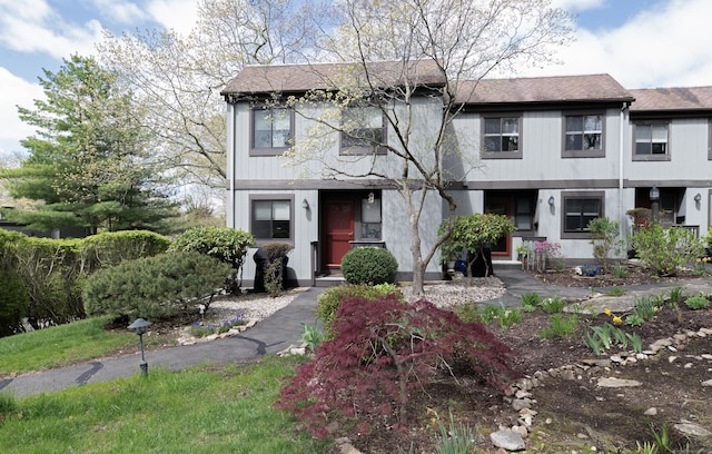 view of front of house with roof with shingles