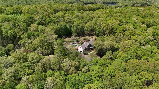 32 Village Dr, East Lyme, CT 06333 - aerial view of property's location featuring a heavily wooded area