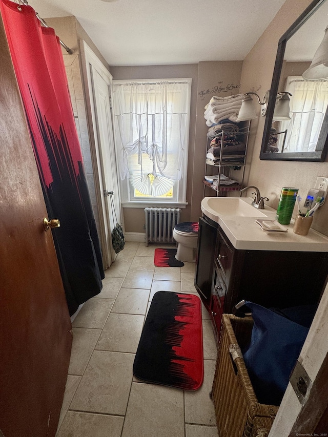572 Forbes St, East Hartford, CT 06118 - full bathroom with vanity, toilet, tile patterned floors, a shower with shower curtain, and radiator