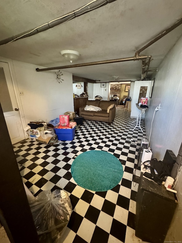 572 Forbes St, East Hartford, CT 06118 - finished basement featuring tile patterned floors