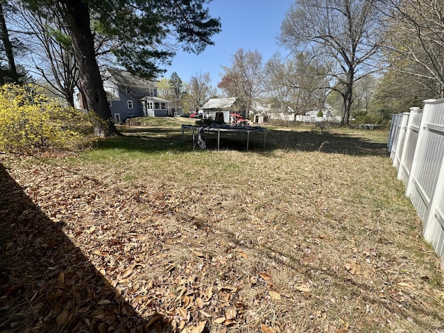 572 Forbes St, East Hartford, CT 06118 - view of yard with fence and a trampoline