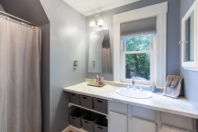 full bath featuring vanity