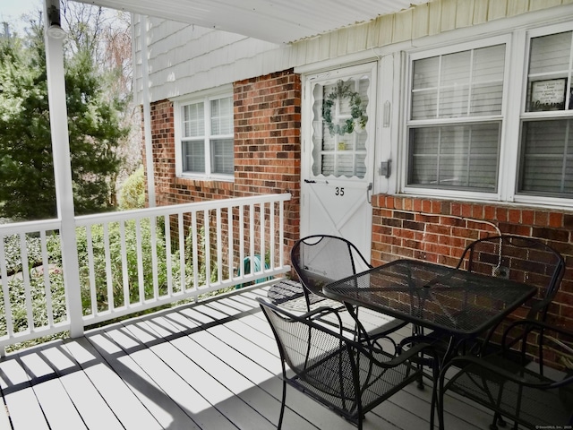 deck featuring outdoor dining space