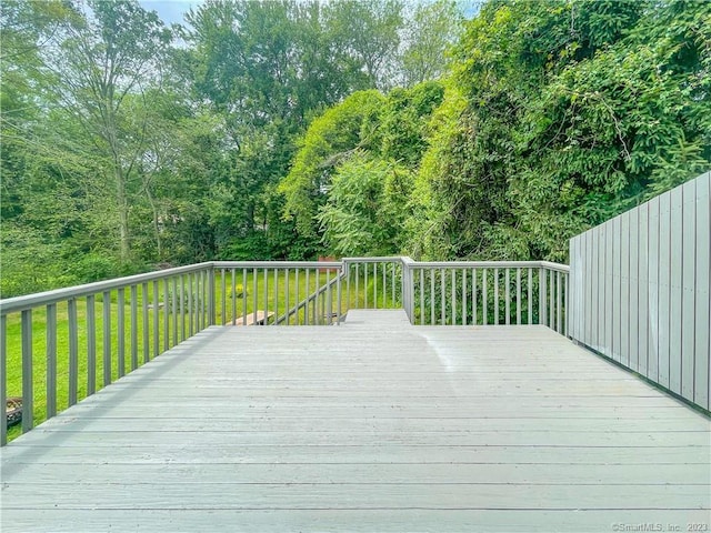 4 Robert Ln, Westport, CT 06880 - wooden terrace featuring a yard