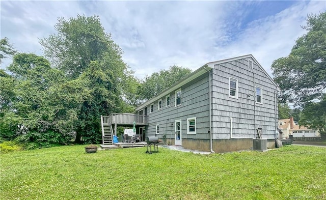 4 Robert Ln, Westport, CT 06880 - back of house with stairway, a wooden deck, a yard, and an outdoor fire pit