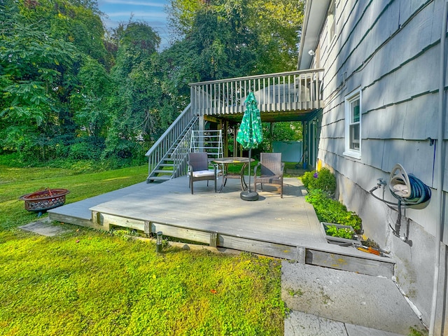 4 Robert Ln, Westport, CT 06880 - view of patio / terrace with a fire pit, stairs, and a wooden deck