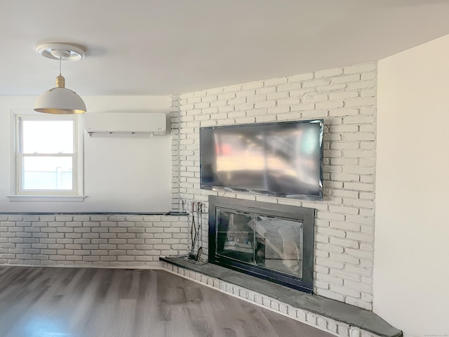 4 Robert Ln, Westport, CT 06880 - detailed view of a wall unit AC, wood finished floors, and a brick fireplace