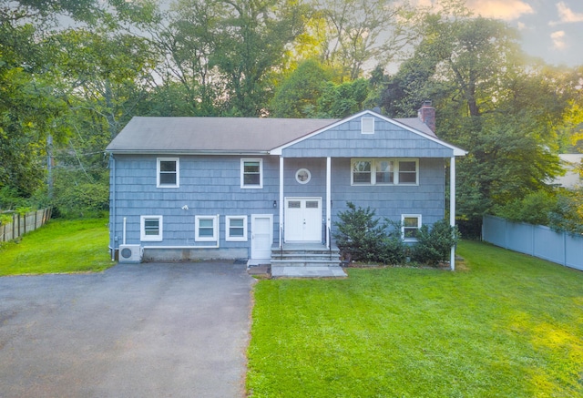 4 Robert Ln, Westport, CT 06880 - split foyer home with a chimney and driveway