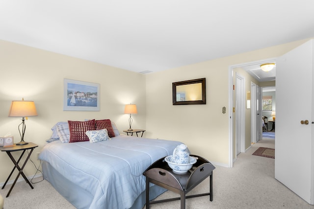 bedroom with carpet flooring and baseboards