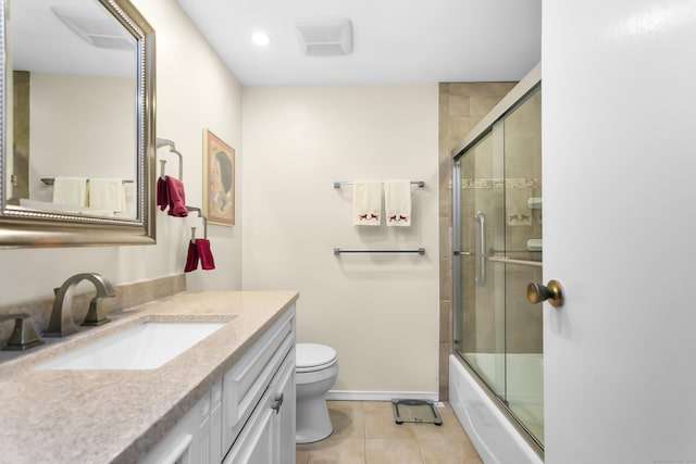 bathroom with tile patterned flooring, toilet, vanity, shower / bath combination with glass door, and recessed lighting