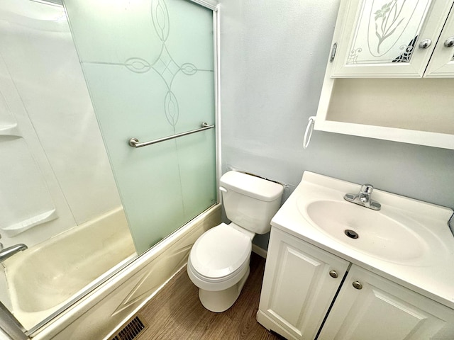 61 Forest St, Naugatuck, CT 06770 - bathroom with vanity, shower / bath combination with glass door, and wood finished floors