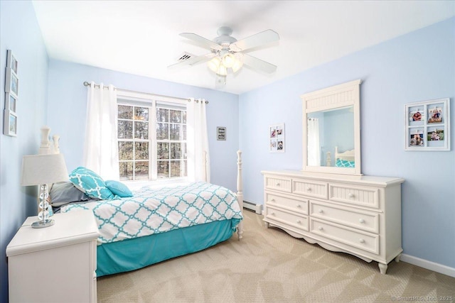 bedroom with baseboards, a baseboard radiator, a ceiling fan, and light carpet