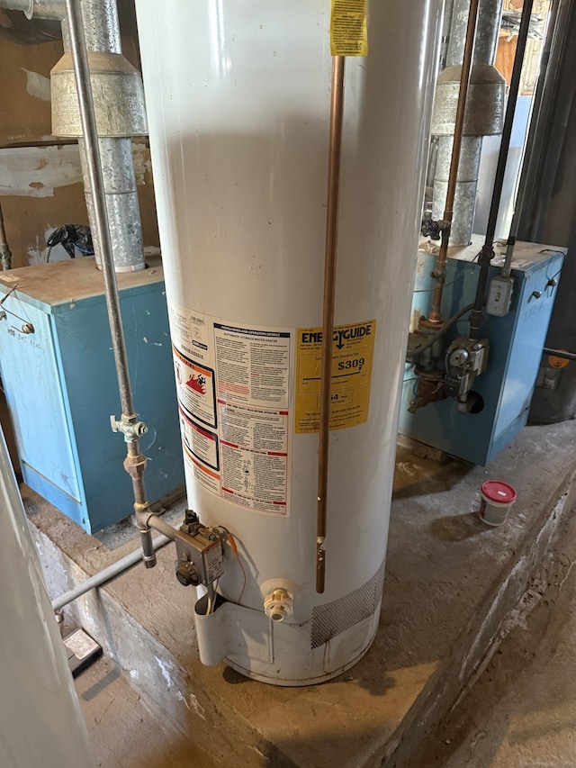 utility room with water heater