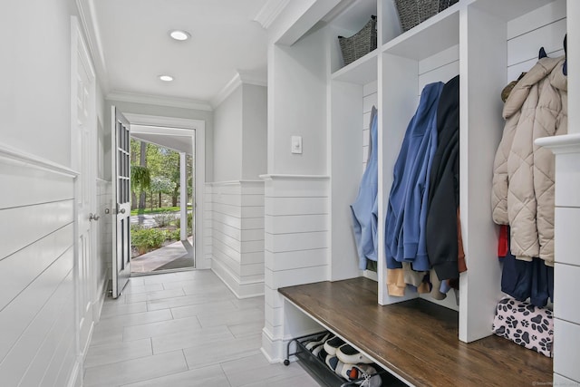 mudroom with crown molding and recessed lighting
