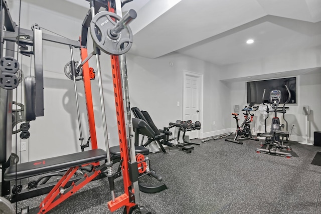 exercise area with baseboards and recessed lighting
