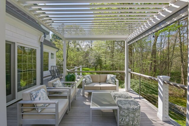 sunroom featuring outdoor lounge area