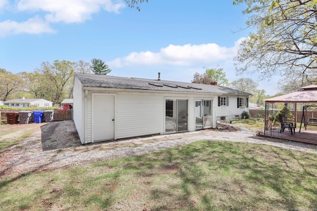 7 Sharren Ln, Enfield, CT 06082 - back of property with a yard, a chimney, a deck, fence, and a gazebo