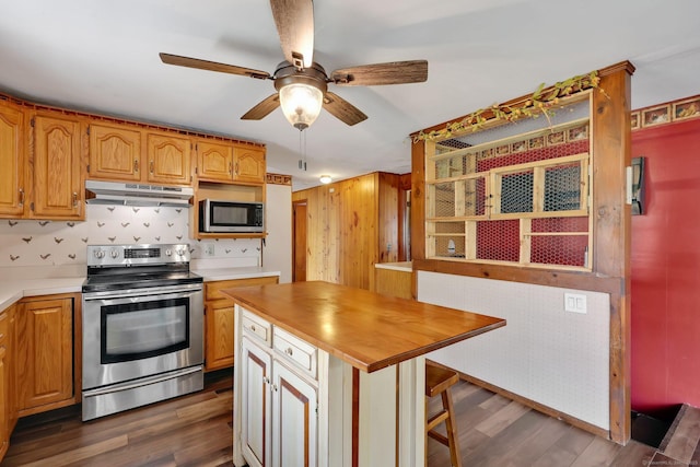 7 Sharren Ln, Enfield, CT 06082 - kitchen featuring stainless steel appliances, dark wood finished floors, ceiling fan, and under cabinet range hood