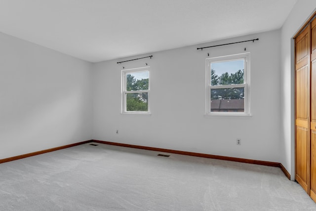 53 Cedar Knolls Dr Unit 53, Branford, CT 06405 - unfurnished bedroom with light colored carpet and baseboards