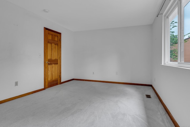 53 Cedar Knolls Dr Unit 53, Branford, CT 06405 - unfurnished room with light carpet, baseboards, and a smoke detector