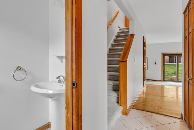 53 Cedar Knolls Dr Unit 53, Branford, CT 06405 - staircase featuring tile patterned floors and baseboards