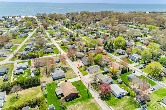 aerial view featuring a residential view and a water view