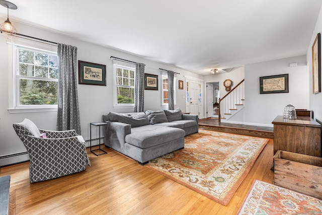 16 Howes Ln, Redding, CT 06896 - living area with hardwood / wood-style floors, stairs, and a baseboard radiator