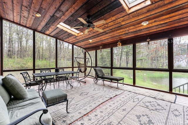 16 Howes Ln, Redding, CT 06896 - sunroom featuring a skylight, ceiling fan, outdoor dining area, and plenty of natural light