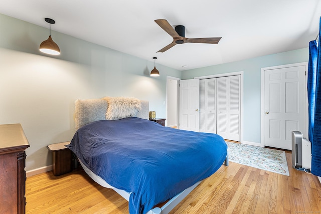 16 Howes Ln, Redding, CT 06896 - bedroom featuring wood finished floors, a ceiling fan, and a closet