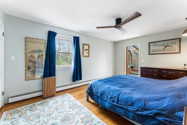 16 Howes Ln, Redding, CT 06896 - bedroom with a baseboard heating unit, wood finished floors, and ceiling fan