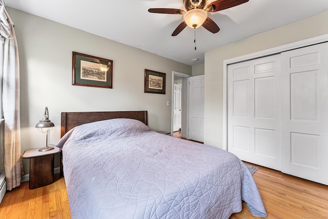 16 Howes Ln, Redding, CT 06896 - bedroom with light wood-style floors, a closet, and ceiling fan