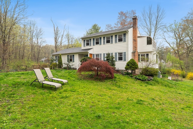 16 Howes Ln, Redding, CT 06896 - rear view of property featuring a chimney