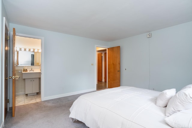955 N Main St, West Hartford, CT 06117 - bedroom with carpet, ensuite bath, and baseboards