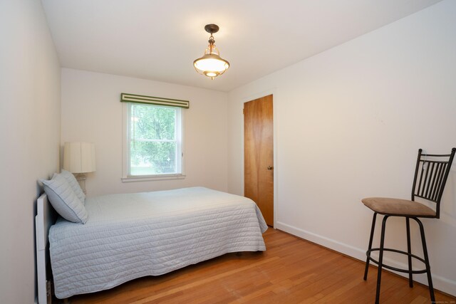955 N Main St, West Hartford, CT 06117 - bedroom featuring light wood-style flooring and baseboards