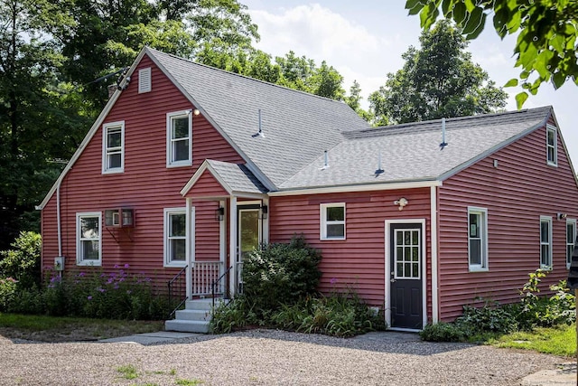 view of front of home with roof with shingles