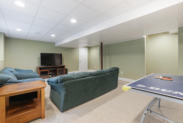 carpeted living area featuring baseboards and recessed lighting