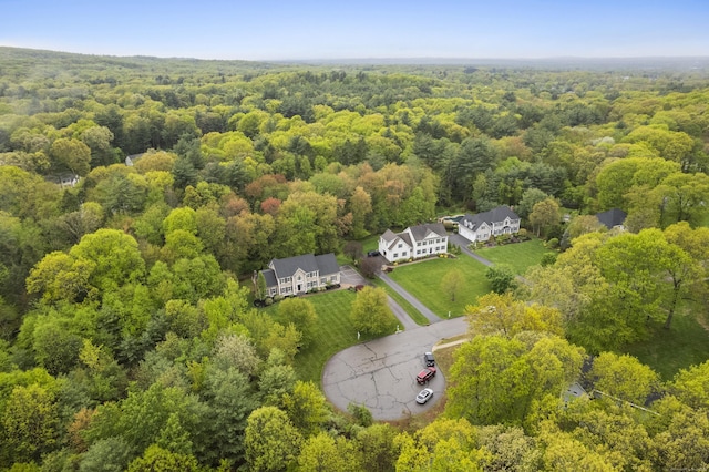 aerial view with a wooded view