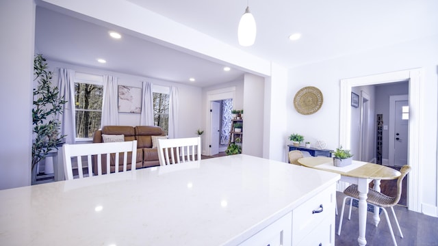 dining room with recessed lighting