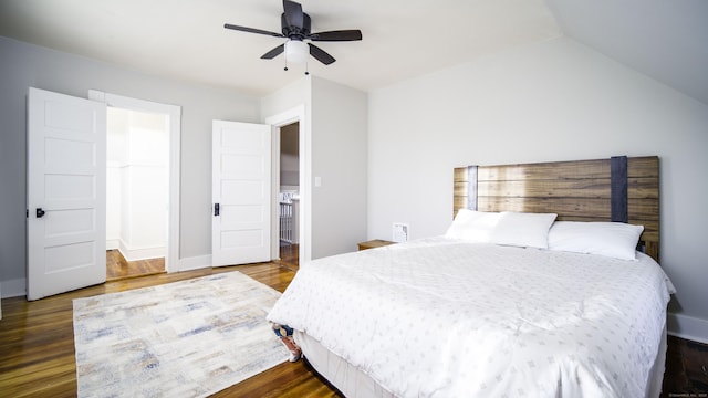 bedroom featuring baseboards, ceiling fan, dark wood finished floors, and lofted ceiling
