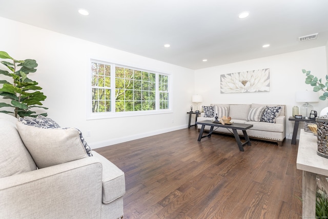 living room with visible vents, recessed lighting, dark wood-style flooring, and baseboards