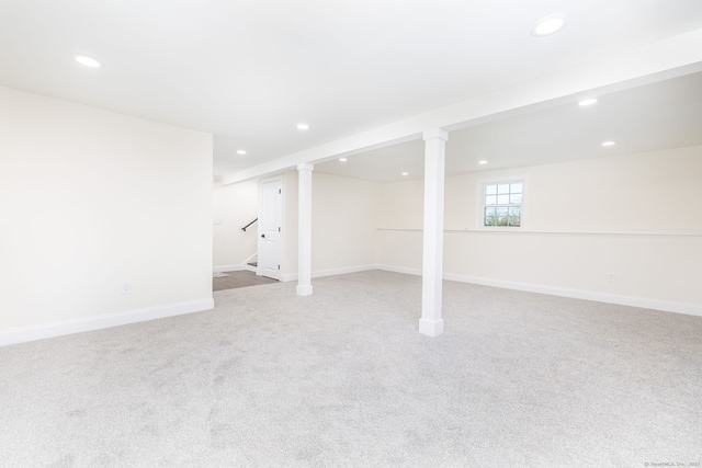 basement with stairway, baseboards, carpet, and recessed lighting