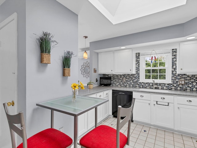 29 Washington Dr, Groton, CT 06340 - kitchen featuring dishwasher, a sink, white cabinetry, decorative backsplash, and light countertops