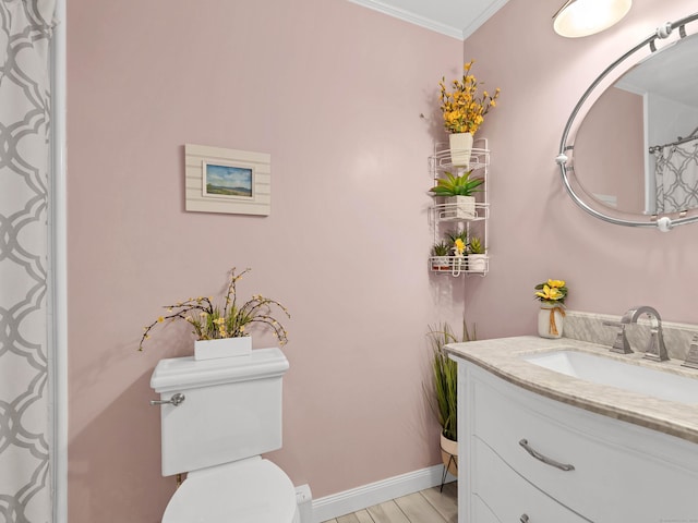 29 Washington Dr, Groton, CT 06340 - full bathroom featuring vanity, ornamental molding, baseboards, and toilet